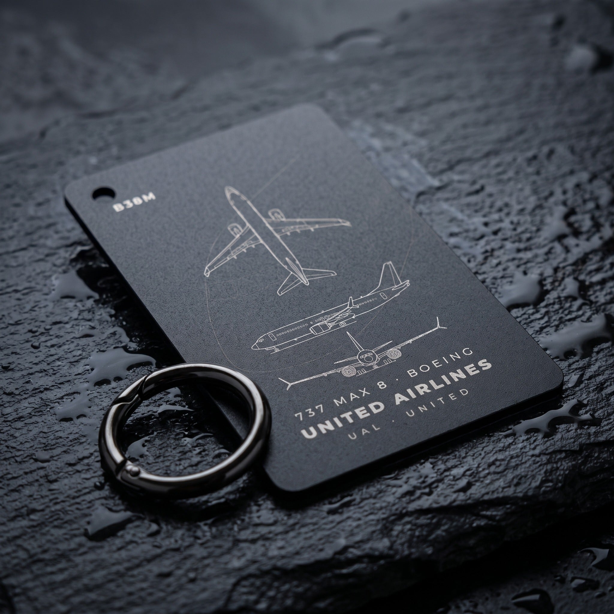 airline card with a gun-black spring ring
